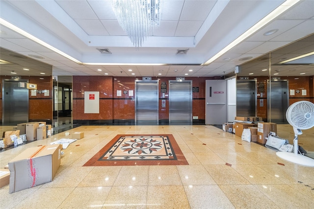 92-29 Queens Blvd Unit 14B, Rego Park, NY 11374 - building lobby featuring a paneled ceiling and recessed lighting