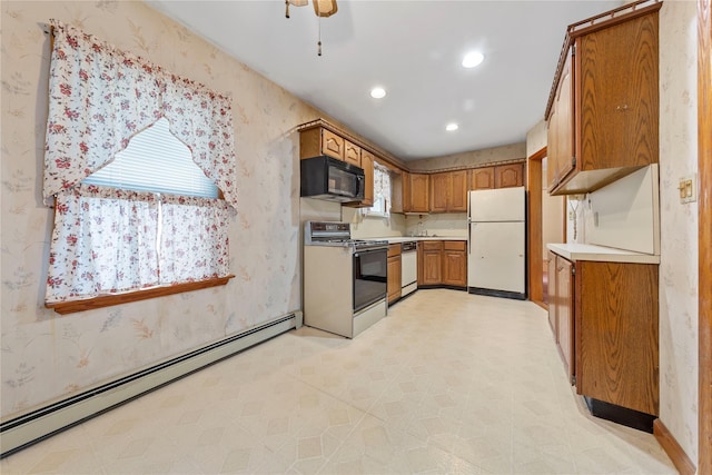 48-67 187th St, Fresh Meadows, NY 11365 - kitchen featuring white appliances, a baseboard heating unit, brown cabinetry, wallpapered walls, and light countertops