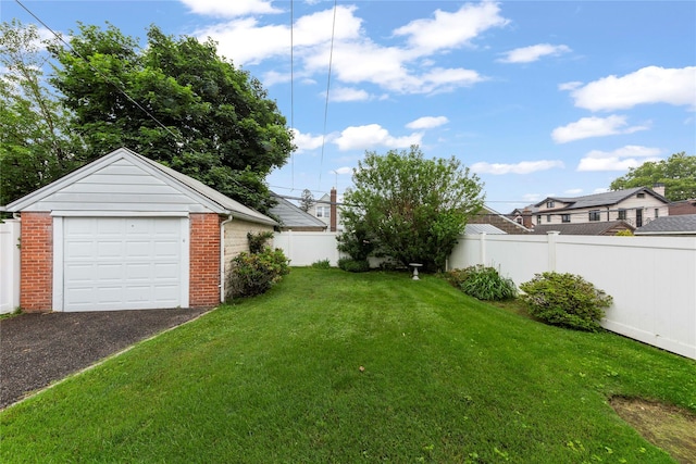 48-67 187th St, Fresh Meadows, NY 11365 - fenced backyard with an outbuilding and a detached garage
