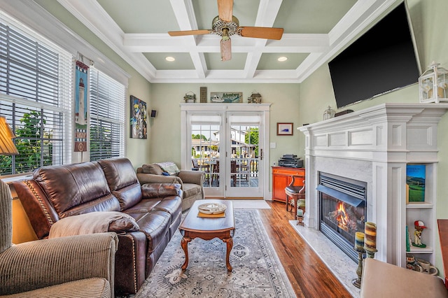 33 S Bay Ave, Amityville, NY 11701 - living room with ceiling fan, coffered ceiling, light wood-type flooring, beamed ceiling, and a premium fireplace
