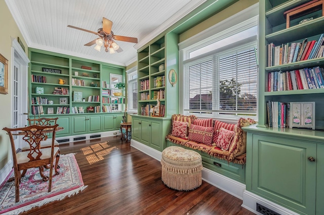 33 S Bay Ave, Amityville, NY 11701 - living area with crown molding, a ceiling fan, dark wood-style flooring, and built in features