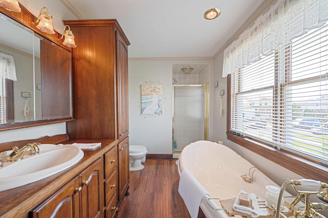 33 S Bay Ave, Amityville, NY 11701 - full bath featuring ornamental molding, a shower stall, a freestanding bath, vanity, and wood finished floors