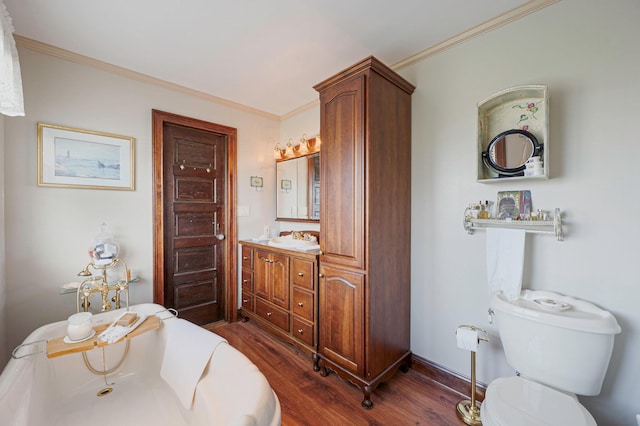33 S Bay Ave, Amityville, NY 11701 - full bathroom with wood finished floors, a freestanding tub, ornamental molding, and vanity