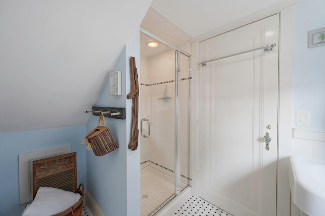 33 S Bay Ave, Amityville, NY 11701 - bathroom with a stall shower, vaulted ceiling, and recessed lighting