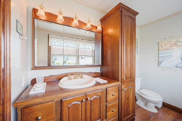 33 S Bay Ave, Amityville, NY 11701 - bathroom featuring ornamental molding, wood finished floors, and vanity