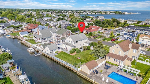 33 S Bay Ave, Amityville, NY 11701 - aerial perspective of suburban area featuring a nearby body of water and a pool area