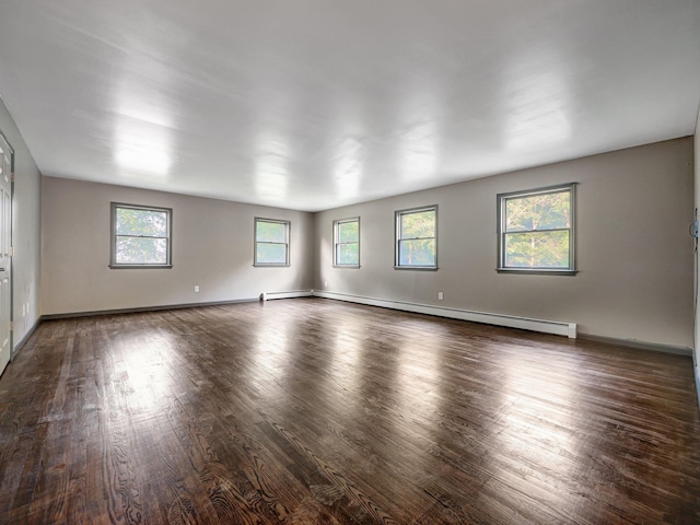285 Hill Rd, Goshen, NY 10940 - spare room featuring a baseboard radiator and wood finished floors