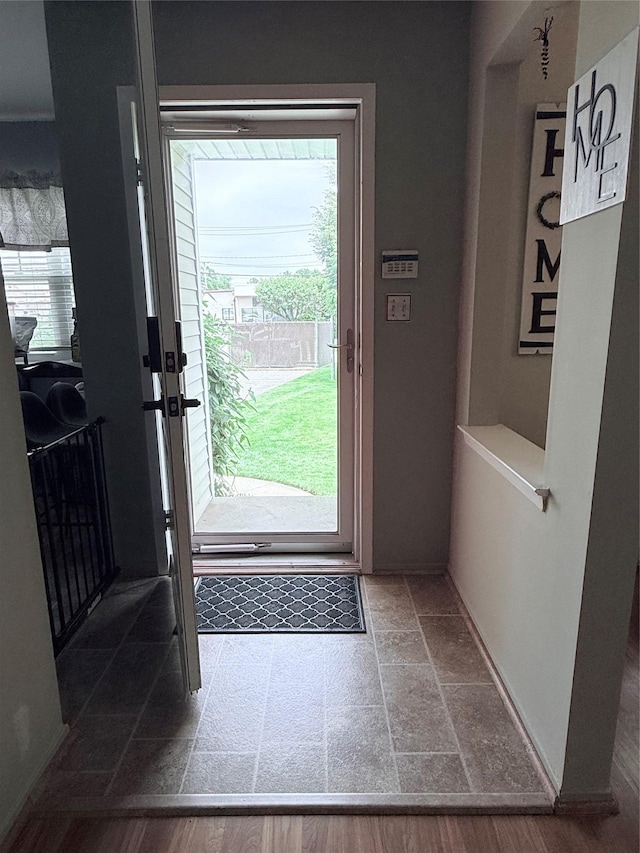 5 Petersen Ct Unit 5, West Babylon, NY 11704 - doorway to outside featuring plenty of natural light and stone finish floors