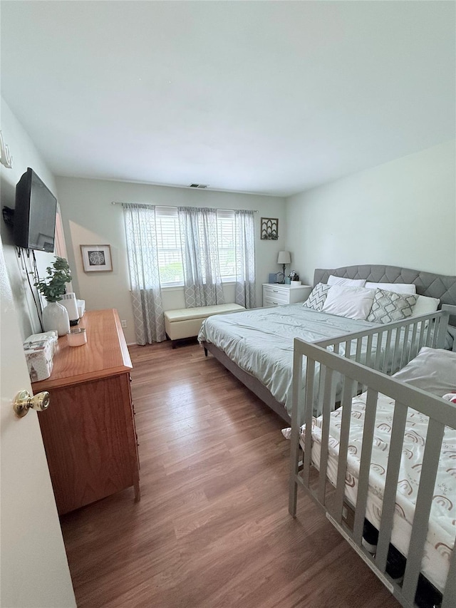 5 Petersen Ct Unit 5, West Babylon, NY 11704 - bedroom with wood finished floors