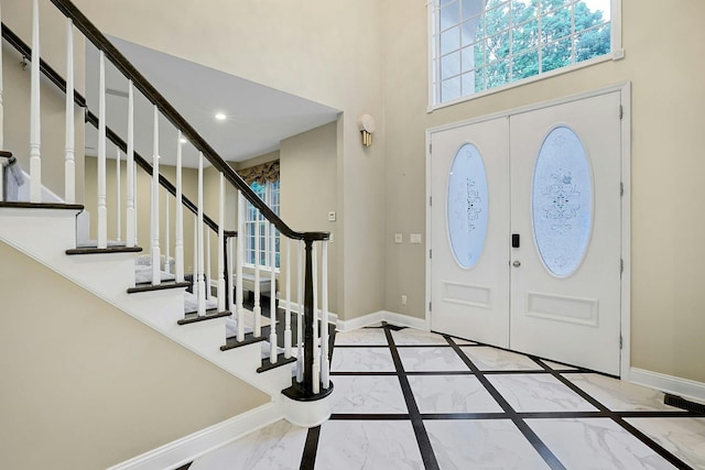 29 Brian Ct, Carmel, NY 10512 - entrance foyer featuring a towering ceiling, marble tiled floors, stairway, inlaid floor details, and recessed lighting