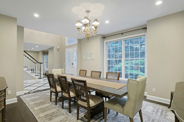 29 Brian Ct, Carmel, NY 10512 - dining room featuring a chandelier, stairs, recessed lighting, and wood finished floors