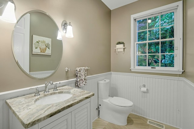 29 Brian Ct, Carmel, NY 10512 - half bathroom with wainscoting and vanity