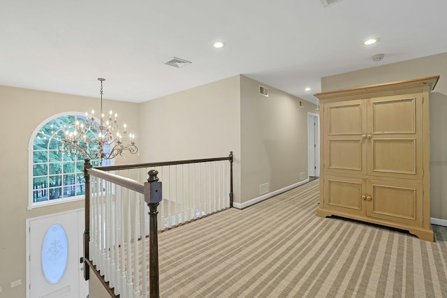 29 Brian Ct, Carmel, NY 10512 - hall with an upstairs landing, recessed lighting, a chandelier, and light colored carpet
