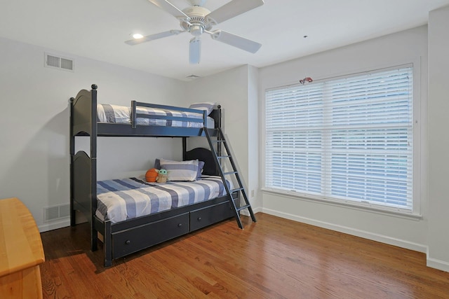 29 Brian Ct, Carmel, NY 10512 - bedroom featuring wood finished floors, multiple windows, and a ceiling fan