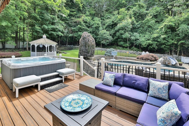 29 Brian Ct, Carmel, NY 10512 - wooden deck featuring a hot tub, a gazebo, and outdoor lounge area