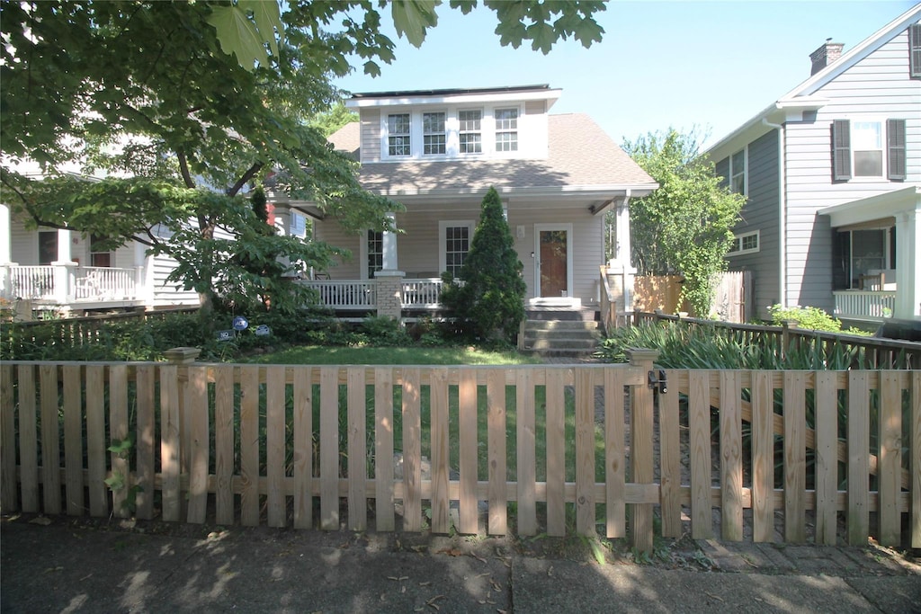 43 S Grand Ave, Poughkeepsie, NY 12603 - view of front of house featuring a fenced front yard and covered porch