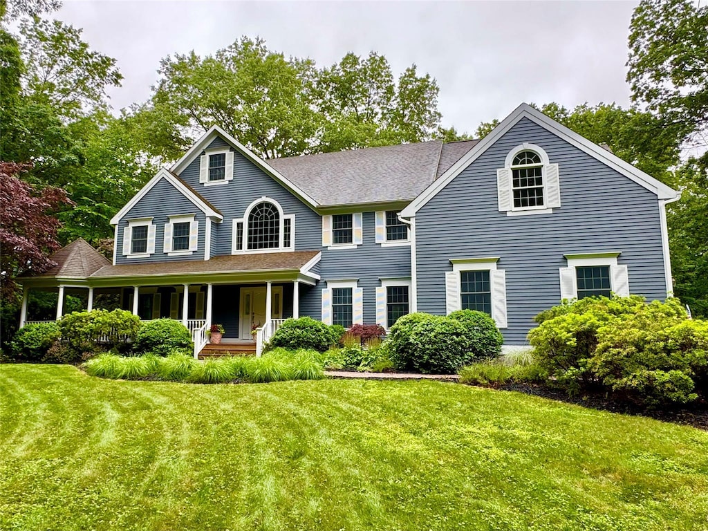 18 Gideon Reynolds Rd, Cross River, NY 10518 - colonial-style house with covered porch and a front lawn
