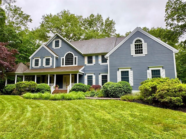 18 Gideon Reynolds Rd, Cross River, NY 10518 - colonial-style house with covered porch and a front lawn