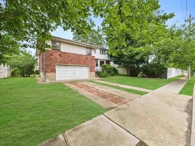 811 Bellmore Ave, East Meadow, NY 11554 - view of front facade featuring a garage, brick siding, and driveway