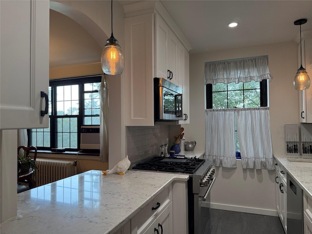 1273 N Ave Unit 4F-5, New Rochelle, NY 10804 - kitchen featuring stainless steel appliances, healthy amount of natural light, white cabinetry, and recessed lighting