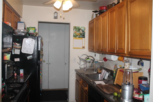 7 Secora Rd Unit H-16, Monsey, NY 10952 - kitchen featuring brown cabinetry, ceiling fan, black appliances, and dark countertops