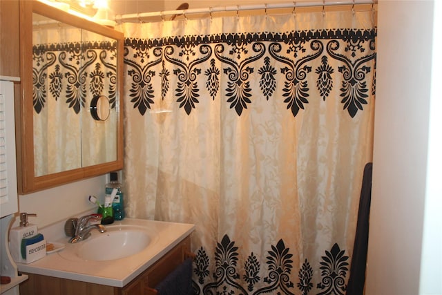 7 Secora Rd Unit H-16, Monsey, NY 10952 - bathroom featuring vanity and curtained shower