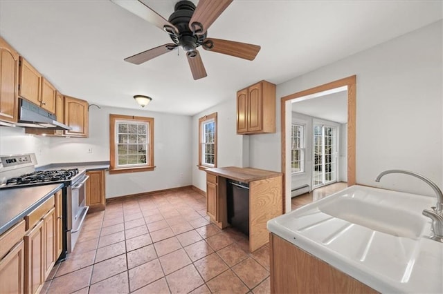 27 County Route 19, Hudson, NY 12534 - kitchen featuring gas stove, under cabinet range hood, a ceiling fan, a baseboard heating unit, and light tile patterned flooring