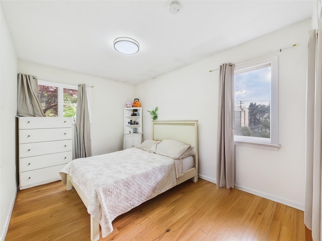 237 Donald Blvd, Holbrook, NY 11741 - bedroom featuring light wood-type flooring and baseboards