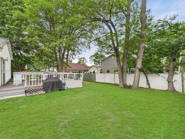 237 Donald Blvd, Holbrook, NY 11741 - fenced backyard with a deck