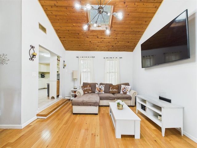 237 Donald Blvd, Holbrook, NY 11741 - living area with a chandelier, light wood-type flooring, high vaulted ceiling, wooden ceiling, and ornate columns