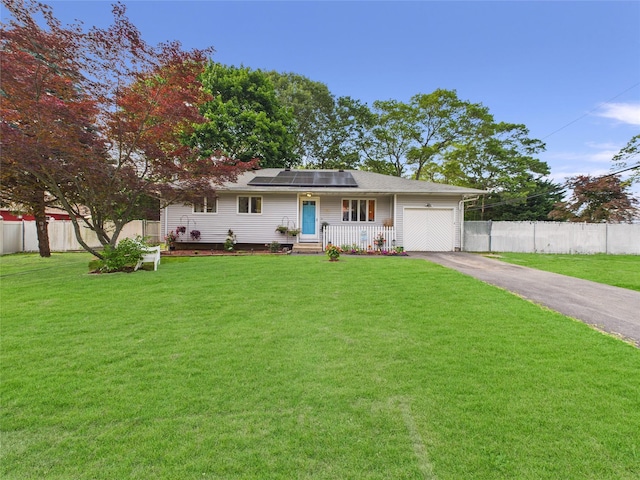 237 Donald Blvd, Holbrook, NY 11741 - ranch-style house with driveway, solar panels, and an attached garage