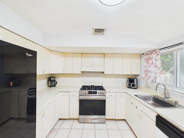 237 Donald Blvd, Holbrook, NY 11741 - kitchen with stainless steel gas range, white dishwasher, light countertops, and under cabinet range hood
