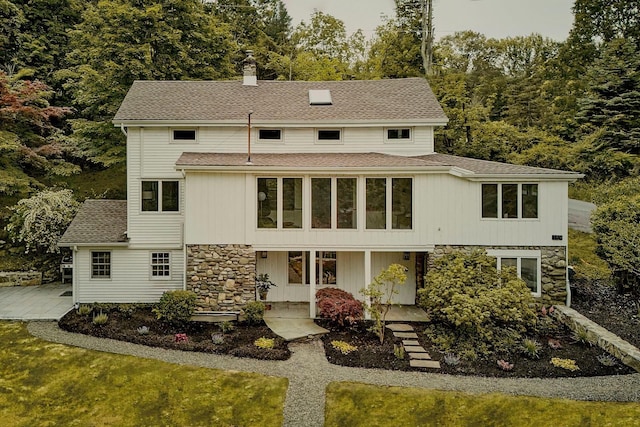 169 Mountain Rd, Cornwall On Hudson, NY 12520 - rear view of house featuring stone siding, a chimney, and roof with shingles