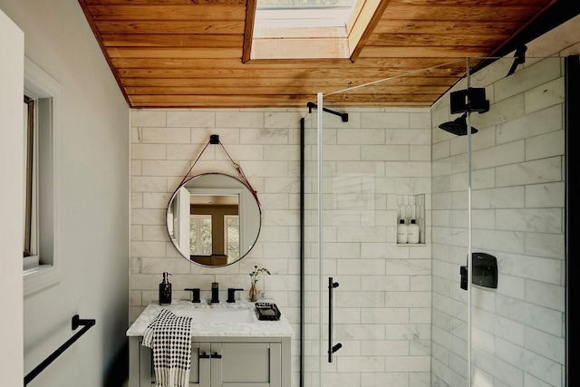 169 Mountain Rd, Cornwall On Hudson, NY 12520 - bathroom featuring wood ceiling, a stall shower, a skylight, and vanity