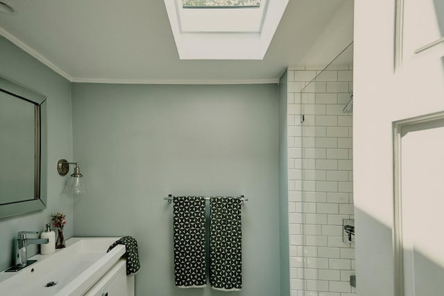 169 Mountain Rd, Cornwall On Hudson, NY 12520 - bathroom with a skylight, crown molding, tiled shower, and vanity