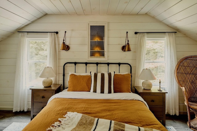 169 Mountain Rd, Cornwall On Hudson, NY 12520 - bedroom with lofted ceiling, wood finished floors, wooden walls, multiple windows, and wood ceiling