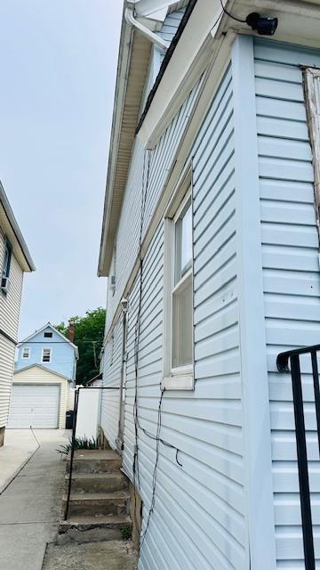 9331 207th St, Queens Village, NY 11428 - view of home's exterior featuring an outbuilding