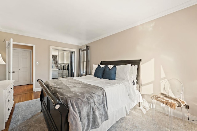 5730 Mosholu Ave Unit 4Ff, Bronx, NY 10471 - bedroom with a closet, crown molding, and dark wood finished floors