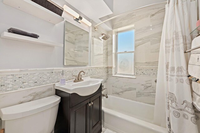 5730 Mosholu Ave Unit 4Ff, Bronx, NY 10471 - full bathroom featuring shower / bathtub combination with curtain, tile walls, vanity, and a wainscoted wall