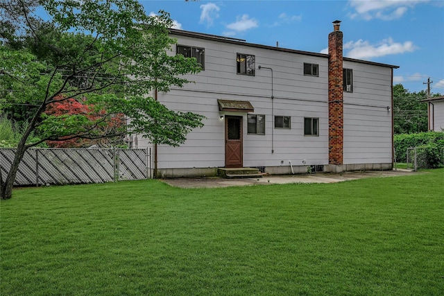 103 Lakeway Dr, West Babylon, NY 11704 - back of property featuring a chimney