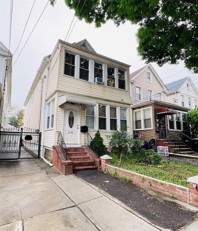 54-08 92nd St, Elmhurst, NY 11373 - view of front of property with entry steps and a gate