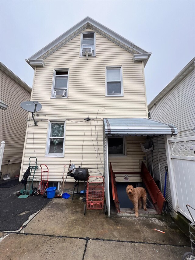 54-08 92nd St, Elmhurst, NY 11373 - back of property with cooling unit