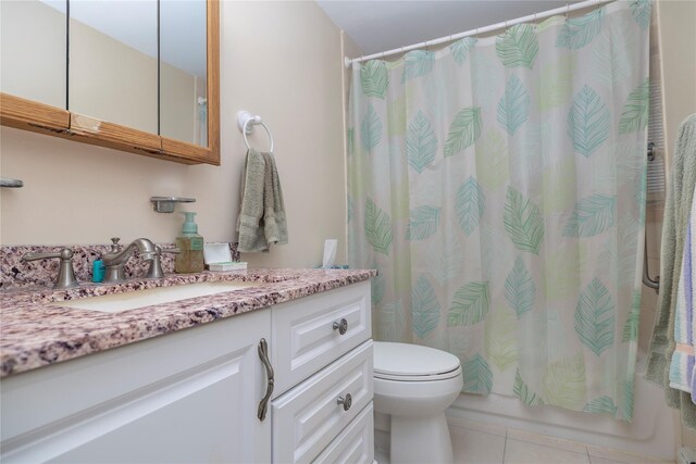179 Alice Ave, Oceanside, NY 11572 - full bath with vanity, tile patterned flooring, and shower / bathtub combination with curtain