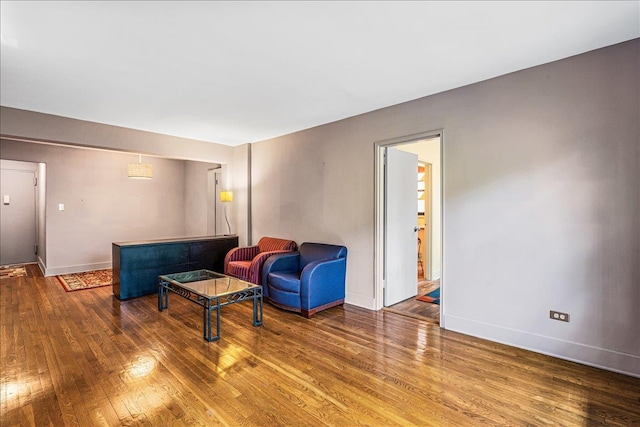 139-15 83rd Ave Unit 520, Briarwood, NY 11435 - living area with hardwood / wood-style flooring and baseboards