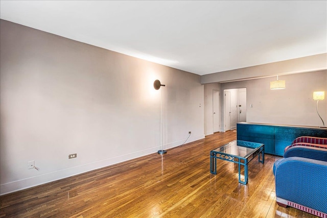139-15 83rd Ave Unit 520, Briarwood, NY 11435 - living area featuring wood finished floors and baseboards