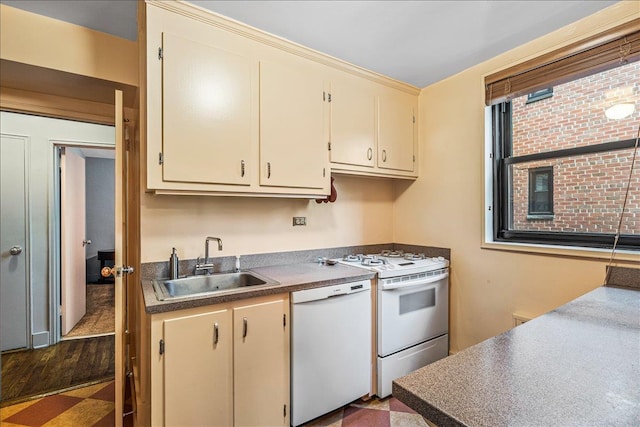 139-15 83rd Ave Unit 520, Briarwood, NY 11435 - kitchen with white appliances and cream cabinets