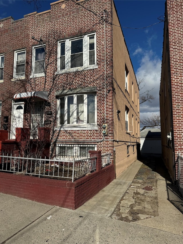 107-03 32nd Ave, East Elmhurst, NY 11369 - view of front facade featuring brick siding