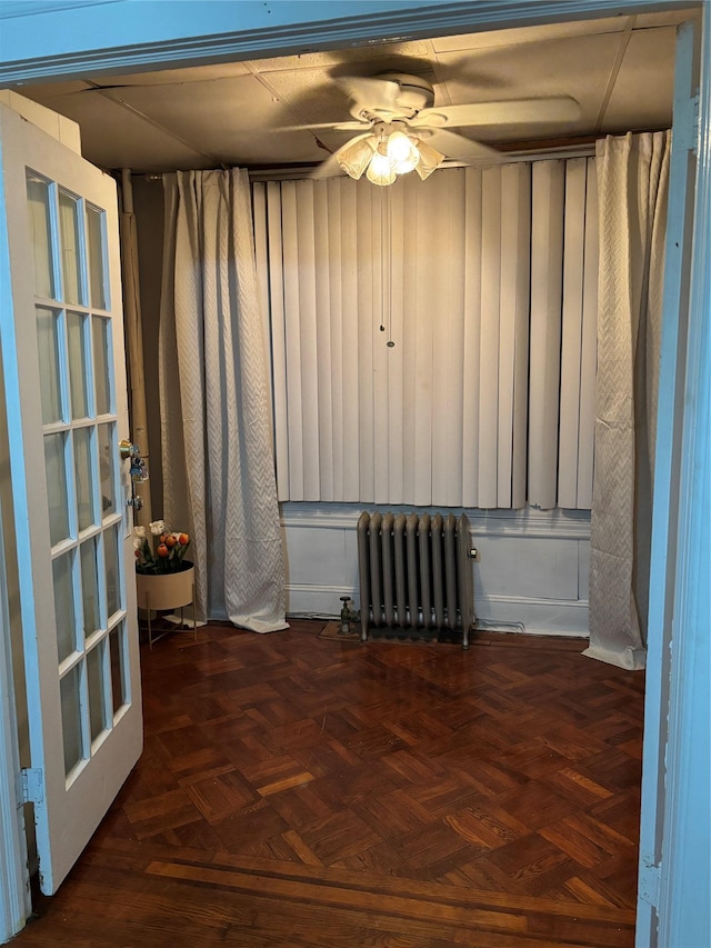107-03 32nd Ave, East Elmhurst, NY 11369 - empty room featuring radiator heating unit and a ceiling fan