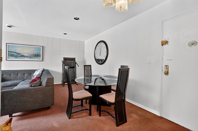 355 Bronx River Rd Unit 4B, Yonkers, NY 10704 - dining room with carpet and a chandelier