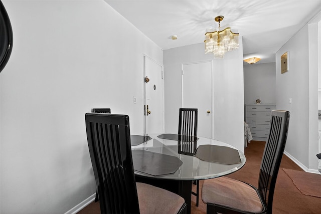 355 Bronx River Rd Unit 4B, Yonkers, NY 10704 - dining space featuring a chandelier and baseboards